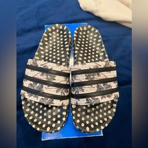 Woman’s Adidas slides, size 8. White and black